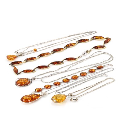 Lot 312 - A small collection of silver clarified amber  jewellery