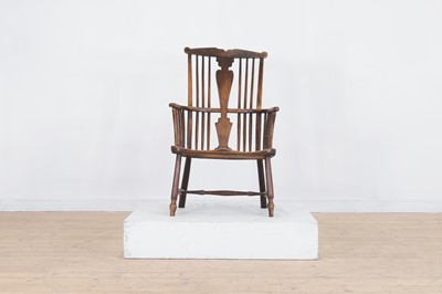 Lot 633 - A George III elm and beech Windsor chair