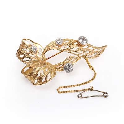 Lot 103 - A 9ct gold diamond ribbon bow brooch, c.1965