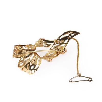 Lot 103 - A 9ct gold diamond ribbon bow brooch, c.1965