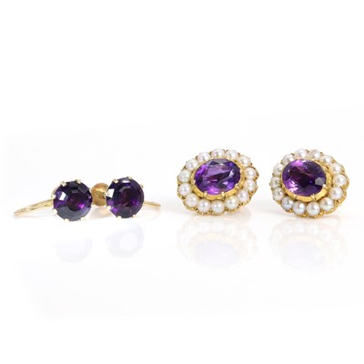 Lot 202 - Two pairs of gold amethyst screw back earrings