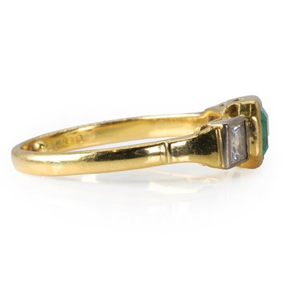 Lot 179 - An 18ct gold emerald and diamond ring