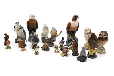 Lot 205 - A collection of porcelain whiskey miniatures and birds