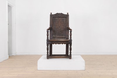 Lot 331 - An oak wainscot chair