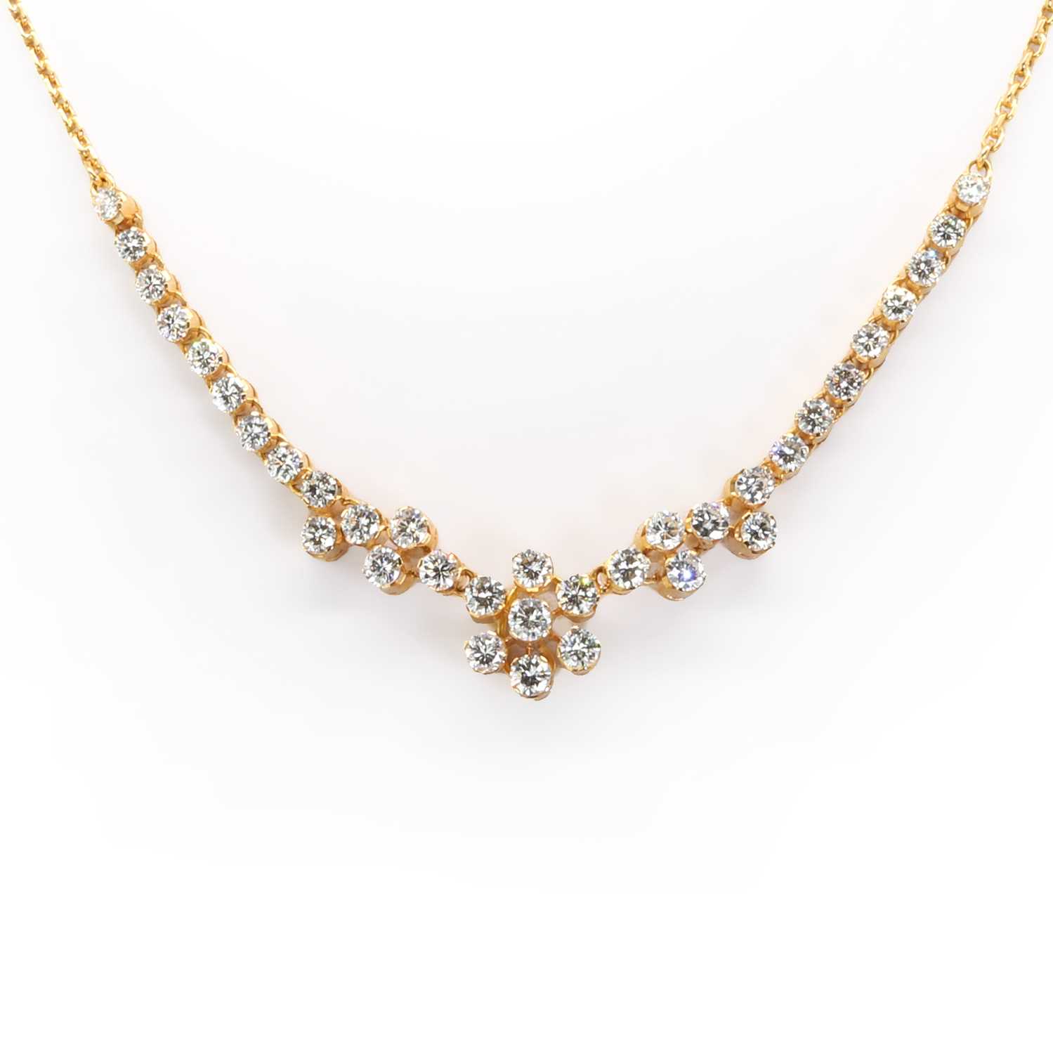 Lot 118 - A diamond floral necklace