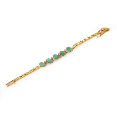 Lot 153 - A gold diamond and jade bracelet