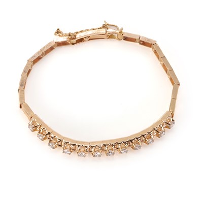Lot 56 - A rose gold diamond bracelet