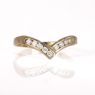 Lot 54 - A 9ct gold and diamond wishbone ring