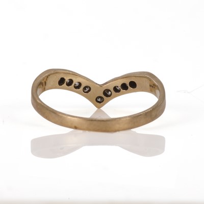 Lot 54 - A 9ct gold and diamond wishbone ring