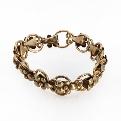 Lot 338 - A gold floral panel expanding bracelet