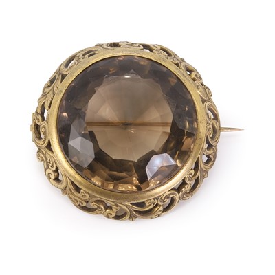 Lot 8 - An antique silver gilt smoky quartz brooch