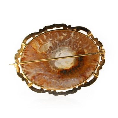 Lot 15 - A Victorian gold mounted hardstone brooch