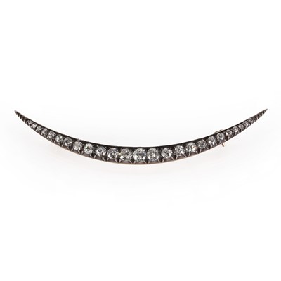 Lot 20 - A Victorian diamond crescent brooch