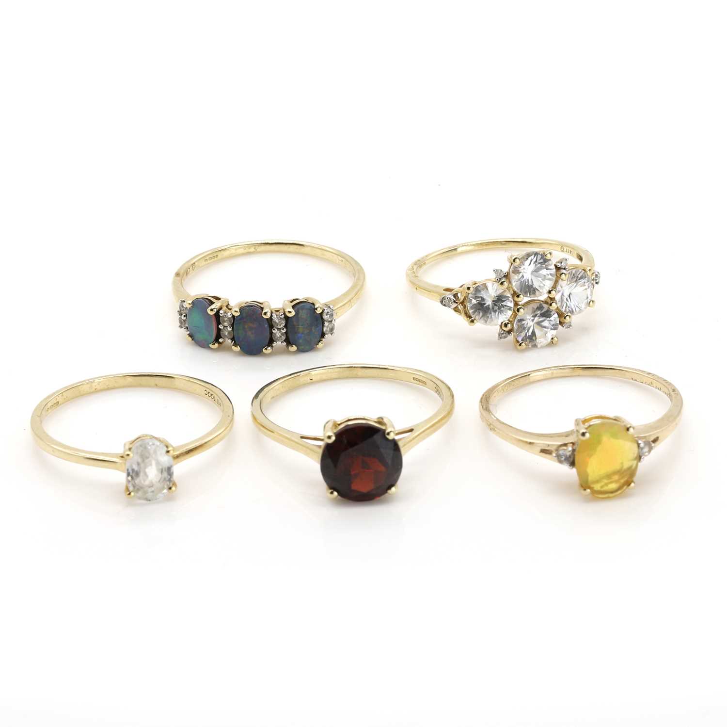 Lot 253 - A group of five 9ct gold gem set rings,