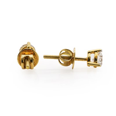 Lot 79 - A pair of single stone diamond stud earrings