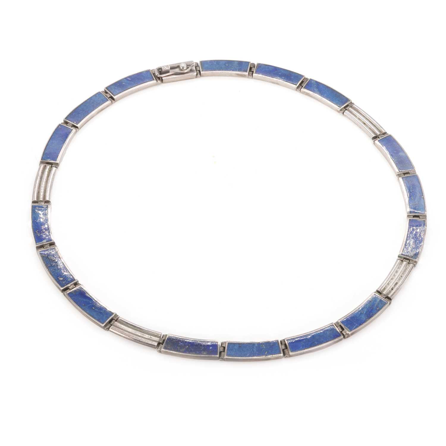 Lot 128 - A silver and lapis lazuli collar necklace