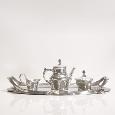 Lot 28 - A German 'Model No. 4402' polished pewter tea set