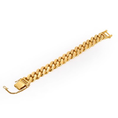 Lot 251 - A solid curb link bracelet