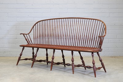 Lot 374 - An American elm model 'SCH5a Continuous Arm Settee'