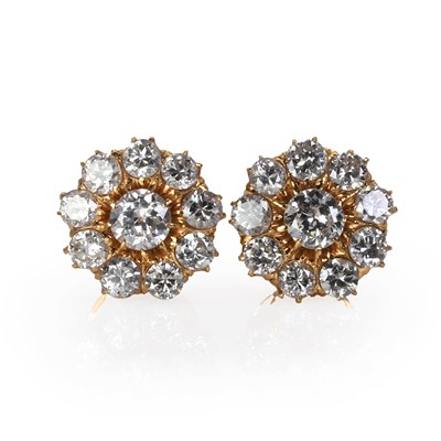 Lot 243 - A pair of diamond cluster earrings