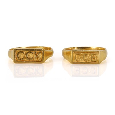 Lot 211 - Two high carat gold initial rings