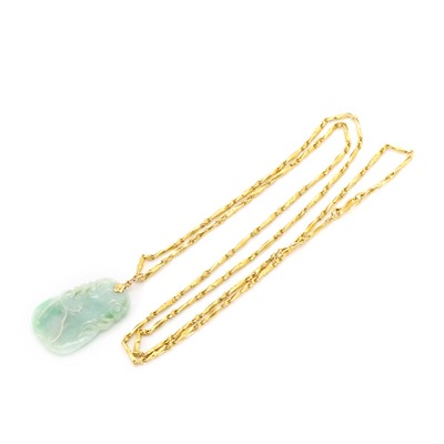 Lot 140 - A gold jade pendant and chain