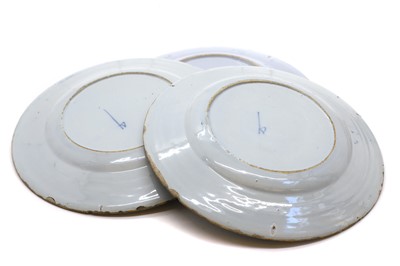 Lot 250 - A group of five English Delft pottery plates