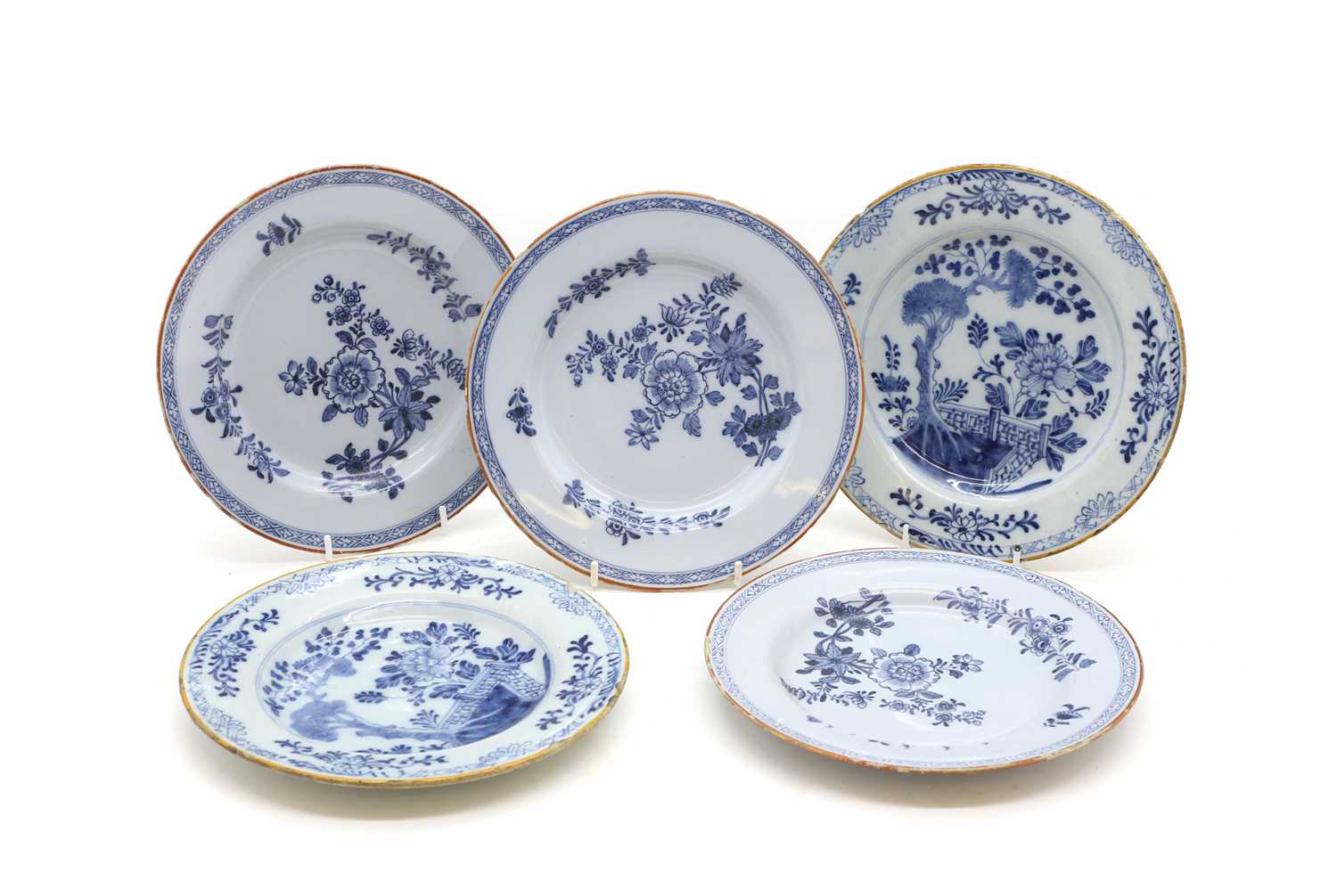 Lot 250 - A group of five English Delft pottery plates