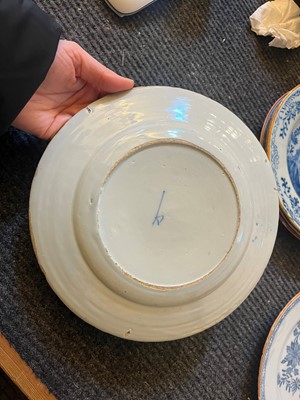 Lot 250 - A group of five English Delft pottery plates