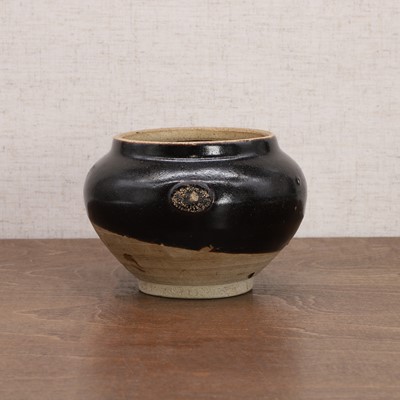 Lot 3 - A Chinese black-glazed jar