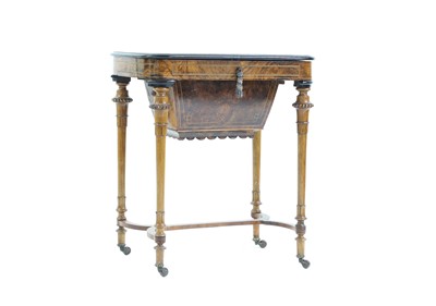 Lot 330 - A Victorian inlaid burr-walnut work table