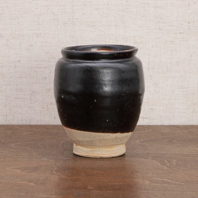 Lot 5 - A Chinese black-glazed jar