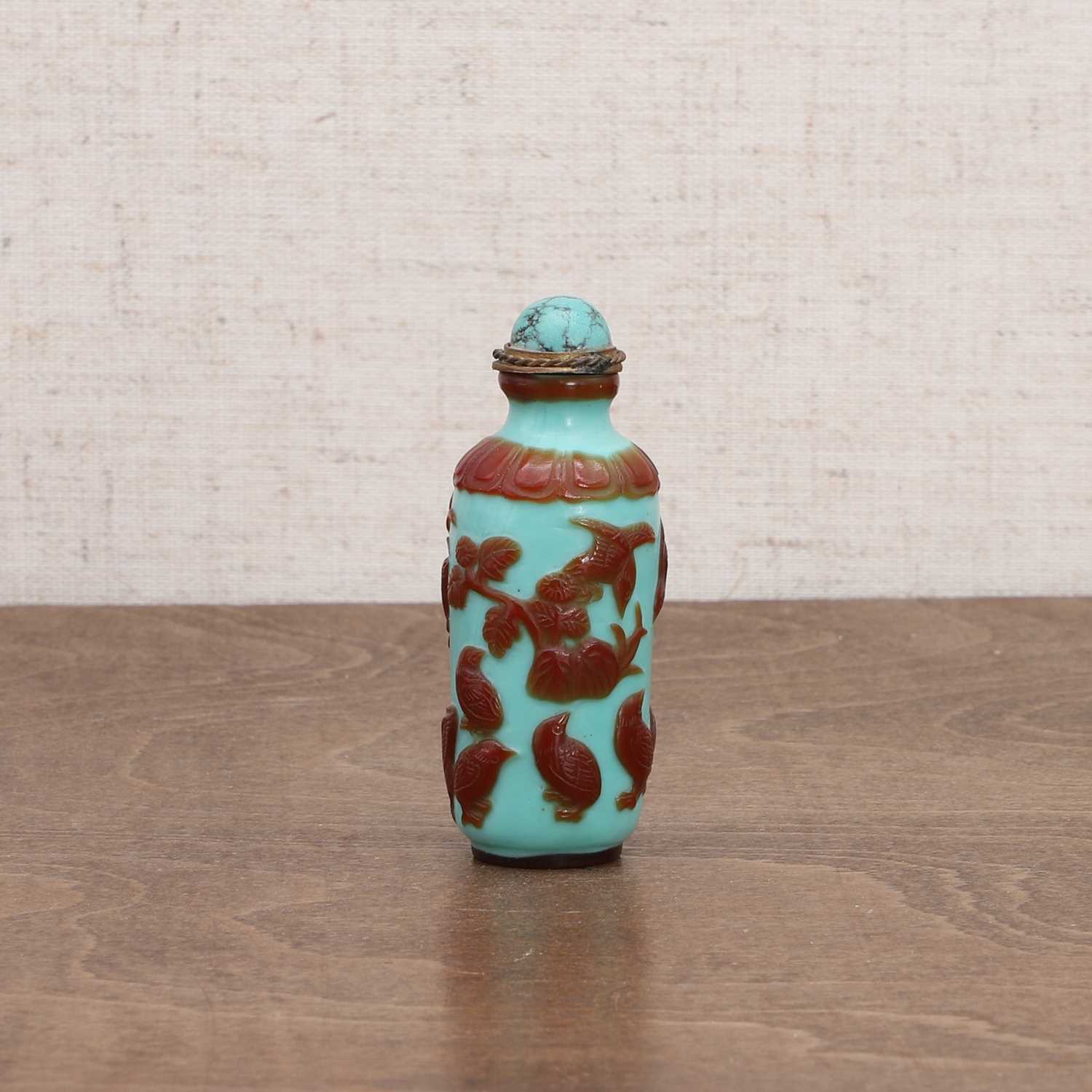 Lot 283 - A Chinese overlay Peking glass snuff bottle