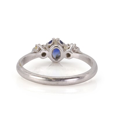 Lot 106 - An 18ct white gold sapphire and diamond ring