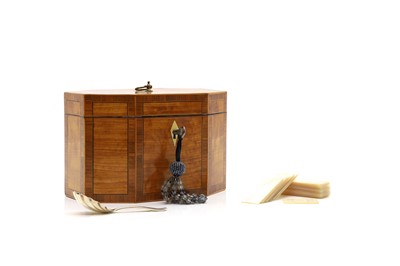 Lot 242 - A George III inlaid satinwood tea caddy