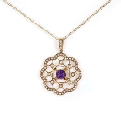 Lot 51 - An Edwardian 9ct gold amethyst and split pearl pendant and chain