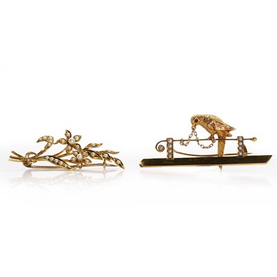 Lot 20 - A late Victorian bird bar brooch and a floral spray brooch