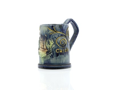 Lot 217 - A Castle Hedingham pottery 'Castle' mug