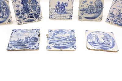 Lot 162 - A group of eight Delft pottery blue and white tiles