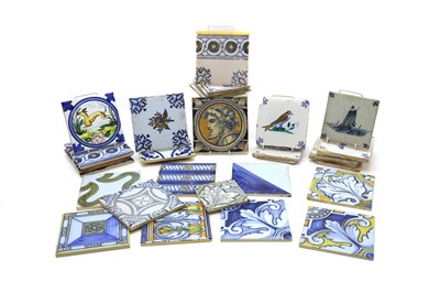 Lot 229 - A collection of pottery tiles