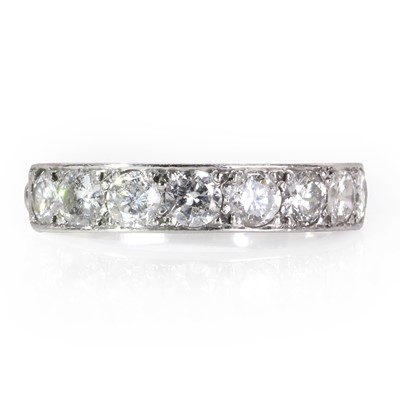 Lot 230 - A diamond half eternity ring