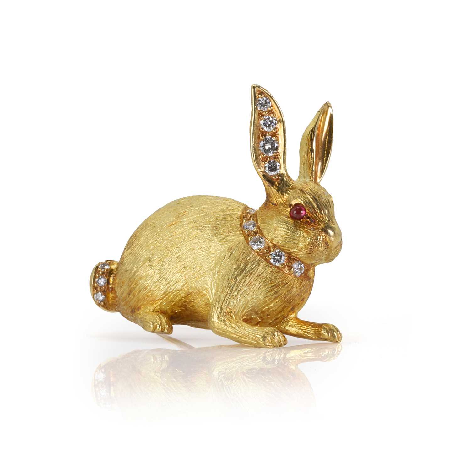 Lot 175 - An 18ct gold ruby and diamond rabbit brooch