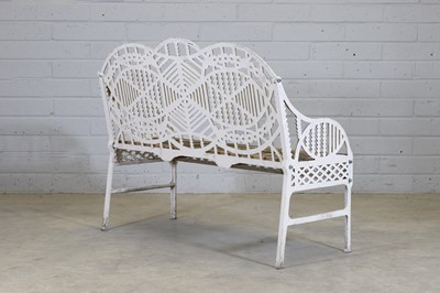 Lot 125 - A cast iron bench