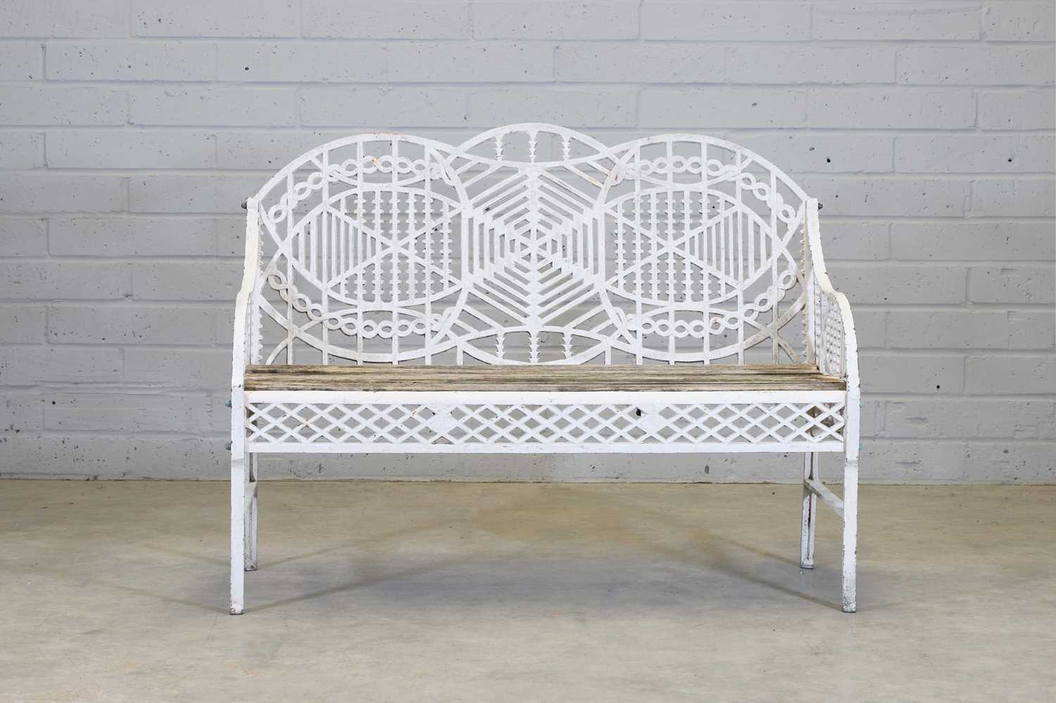 Lot 125 - A cast iron bench