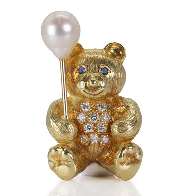 Lot 176 - An 18ct gold cultured pearl, sapphire and diamond teddy bear brooch