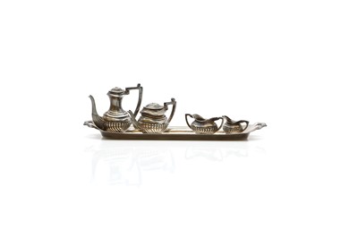 Lot 36 - A silver novelty miniature tea service