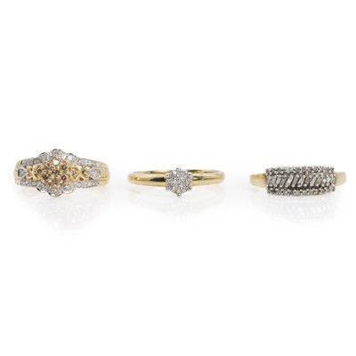 Lot 335 - A group of three 9ct gold and diamond rings