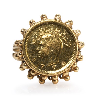 Lot 504 - A quarter Pahlavi coin on a gold mount