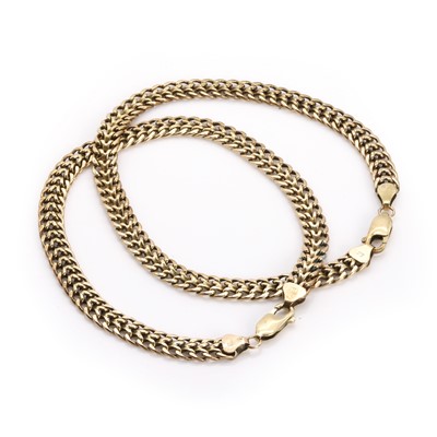 Lot 328 - Two gold double curb link bracelets