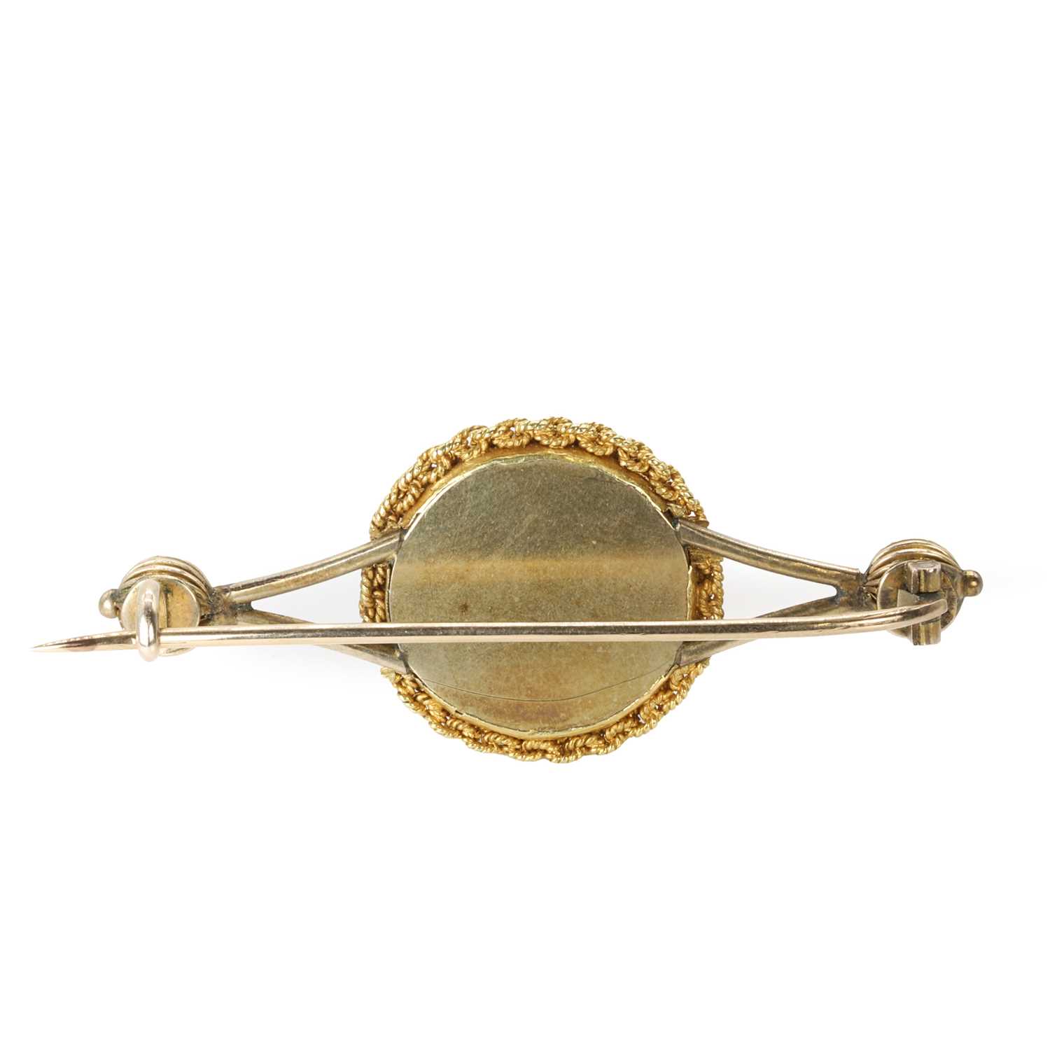 Lot 9 - A gold and turquoise disc shaped cluster, later mounted on a bar brooch